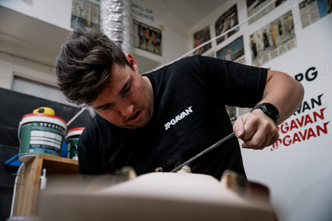 A cricket bat being shaped by hand at the JPGavan Sydney workshop